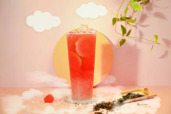 cocktail with ice cream and red berries on a white background