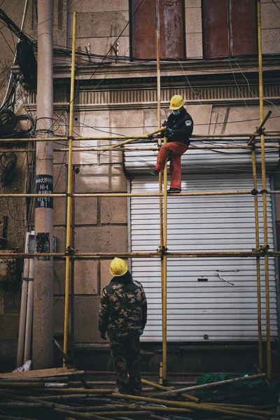 worker in protective mask and gloves in the factory