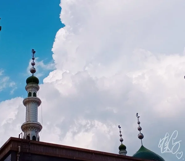 the mosque of the holy trinity, the church of the savior, the tower of the city.
