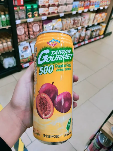 close up of a hand holding a food store