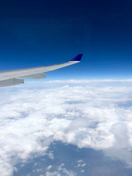 wing of a plane in the sky