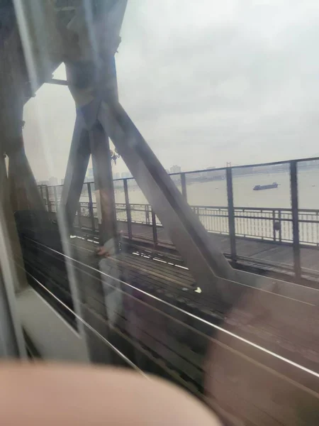 motion blur of a man in a suit with a backpack on the background of the city