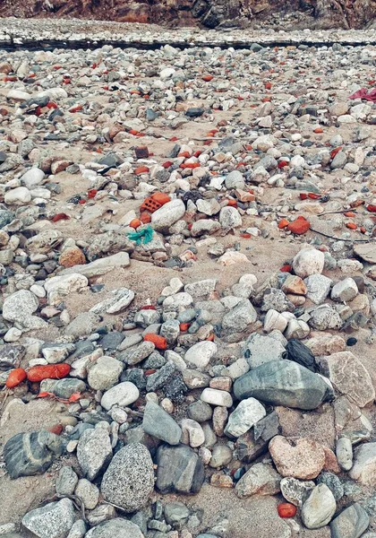 a pile of stones on the beach