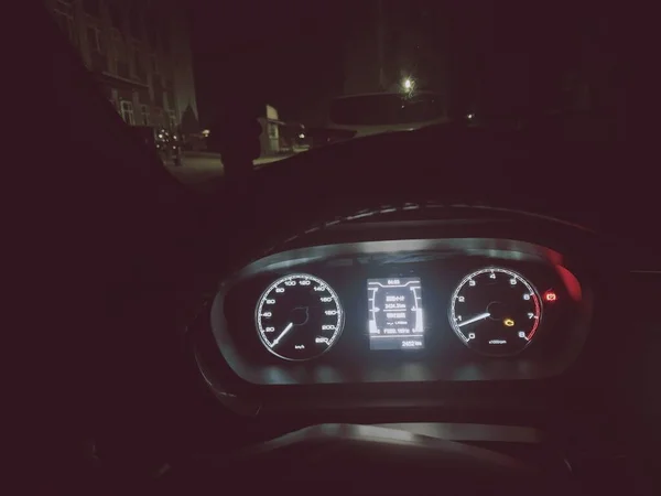 car dashboard, traffic light, motion blur