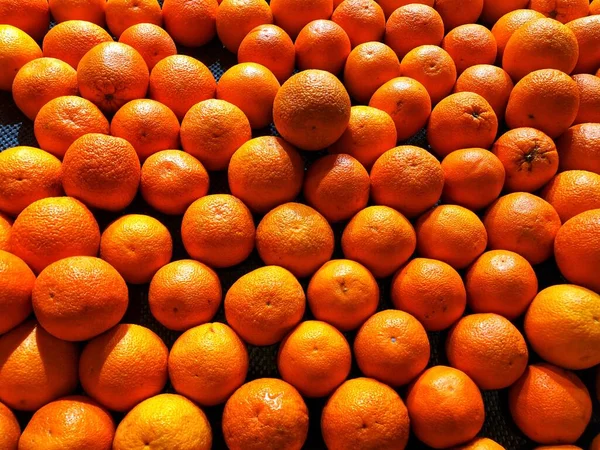 fresh ripe oranges on a white background