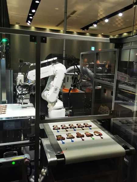 a closeup shot of a factory worker in a modern kitchen