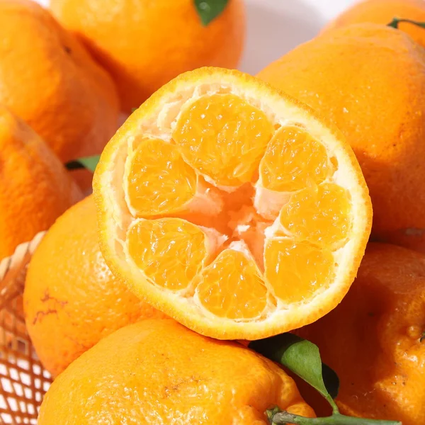fresh orange fruit with slices of lemon