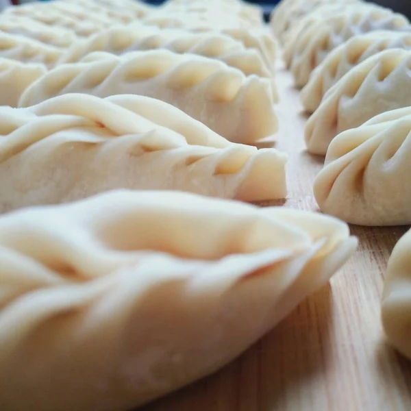 close up of raw dumplings