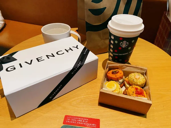 coffee break, food and drink concept-close up of delicious lunch box with french fries and paper cup
