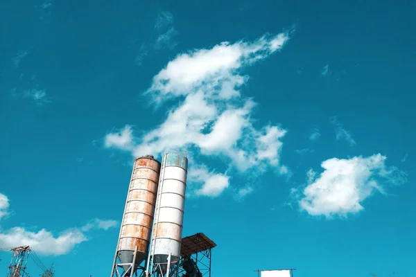 industrial factory, blue sky and clouds