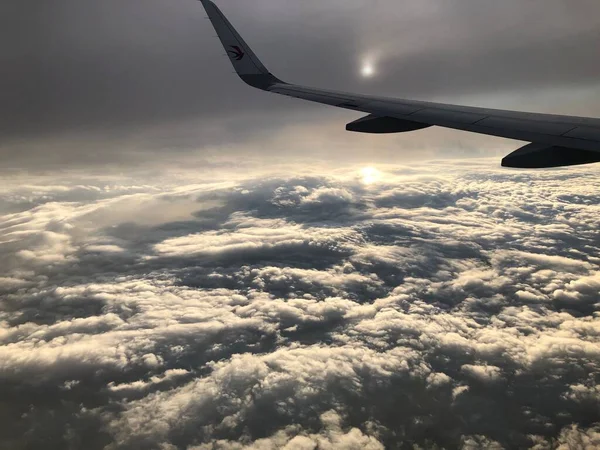 wing of a plane in the sky