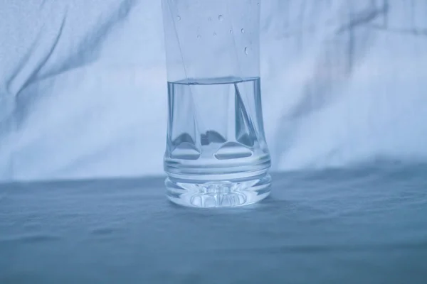 glass of water on a white background