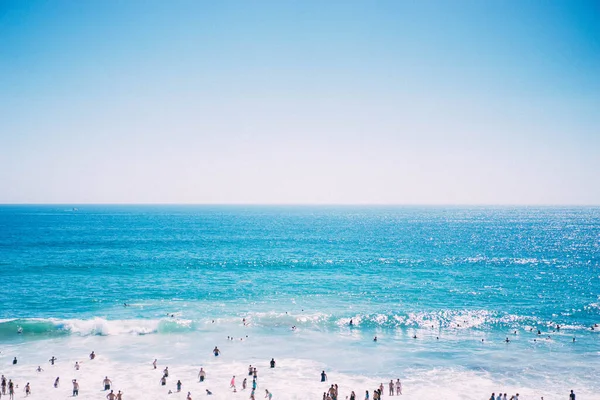 beach with blue sky and white sand