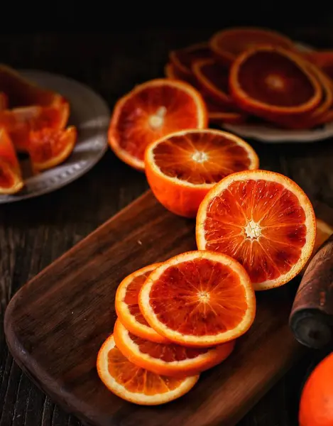 fresh sliced orange slices on a wooden table