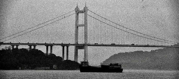 black and white image of the bridge in the city of san francisco