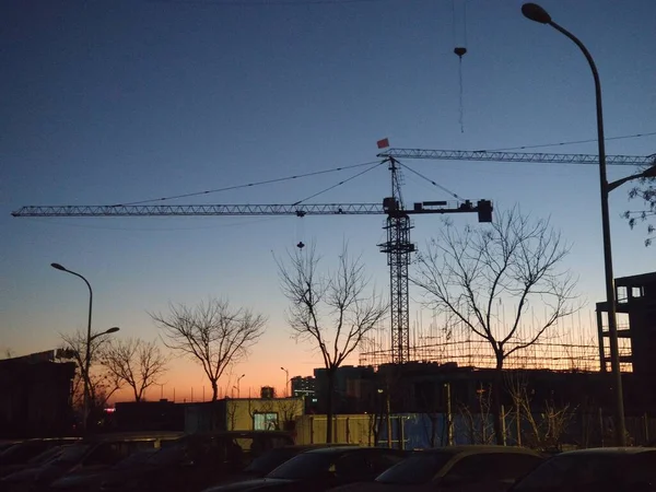 construction cranes on the background of the building