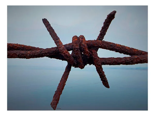 old rusty metal chain on a white background