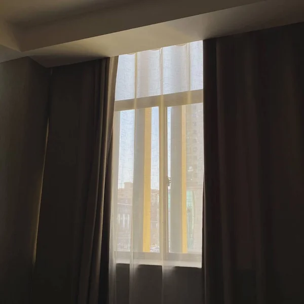 window with curtains in the room