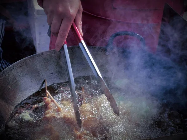 cooking meat in the kitchen