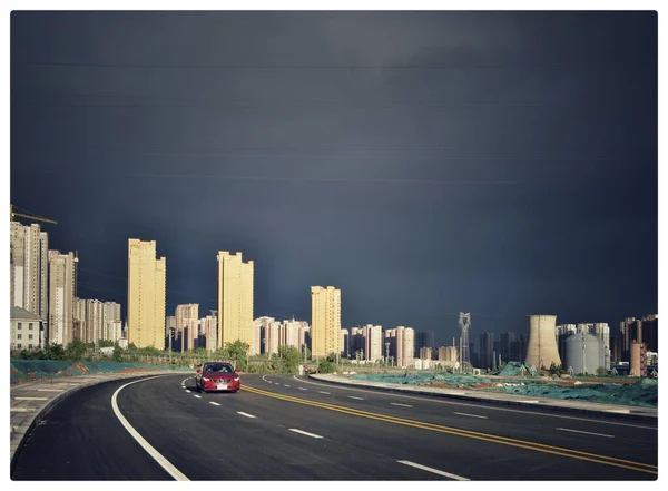 road with city buildings and roads