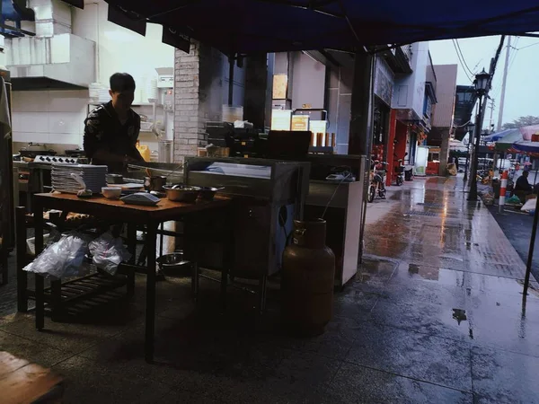 old man in a cafe