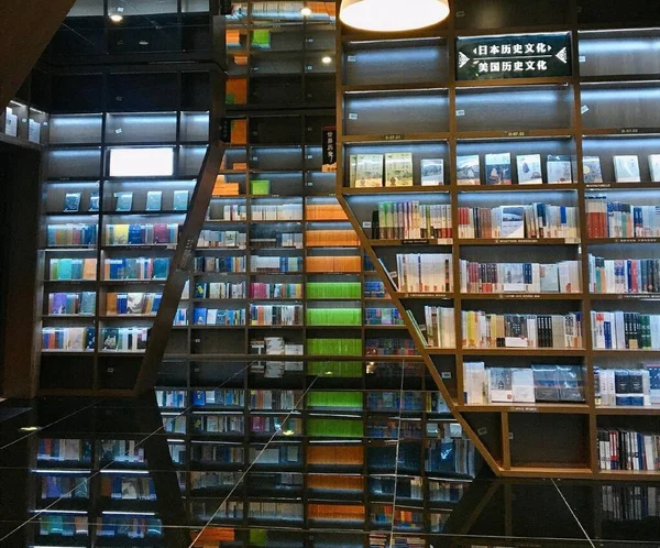 library interior with books and book