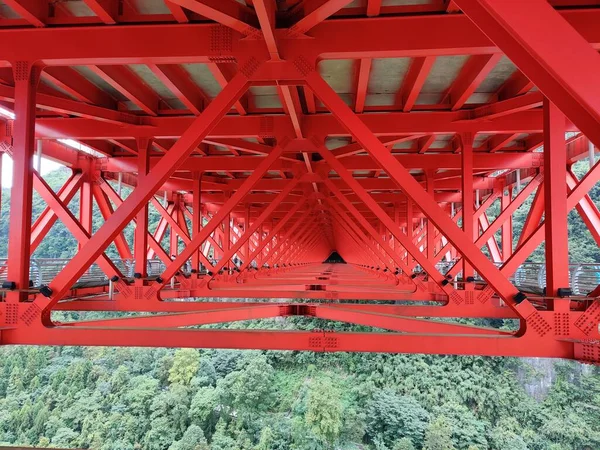 red and white train bridge