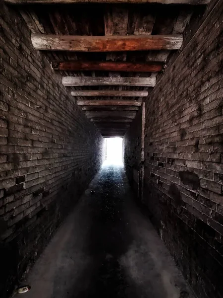 underground tunnel with a lot of black and white