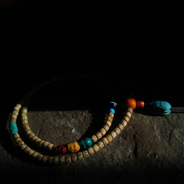 close-up of a beautiful colorful beads on a black background