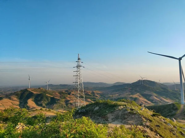 scenic landscape, alternative power technology. electricity wind turbines generator