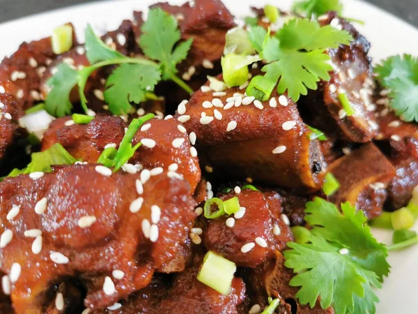 fried fish with vegetables and herbs