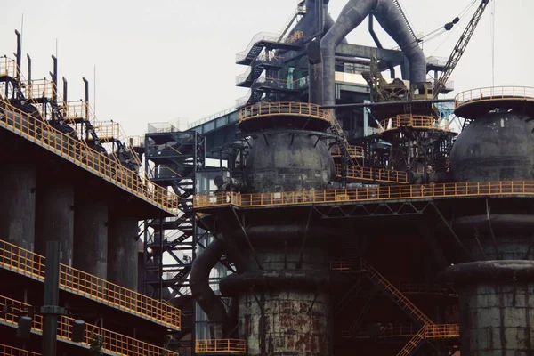 industrial factory, steel pipelines and coal