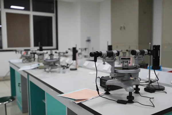 professional video conference room with laptop and microscope