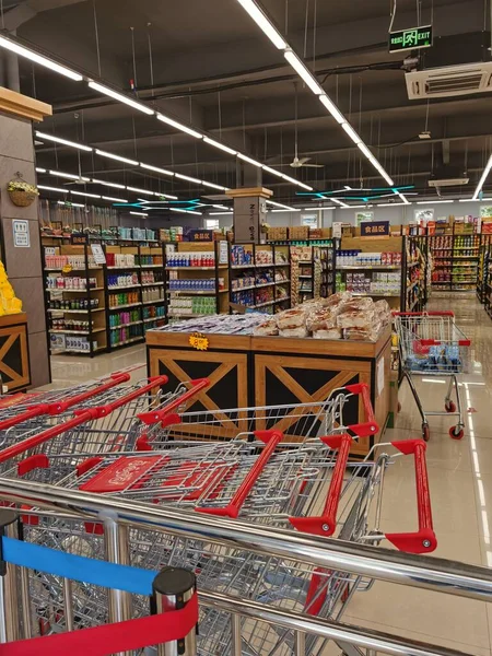 interior of a supermarket with a large warehouse