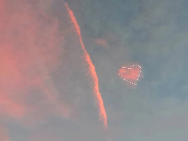 heart shape with clouds and sky