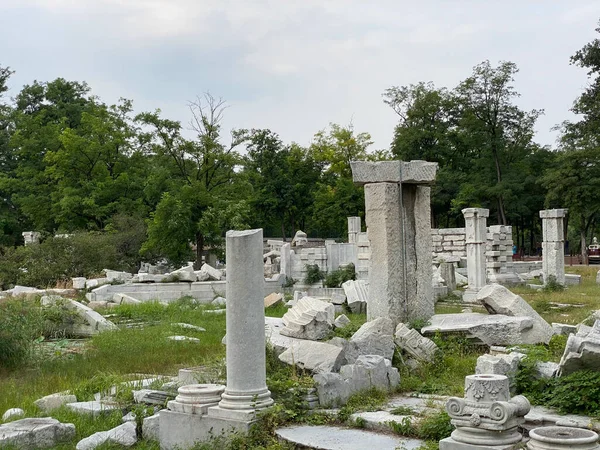 ancient stone columns in the park