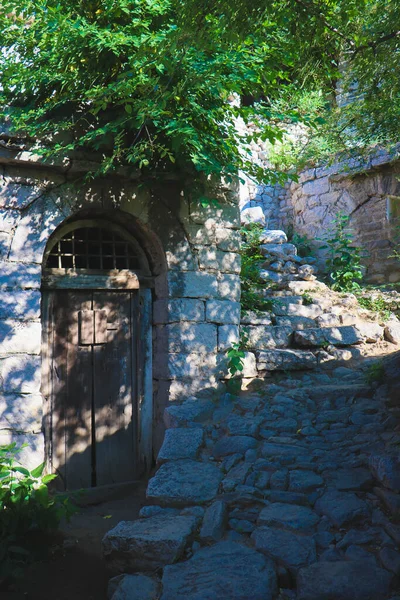 old stone door in the city of kotor, montenegro