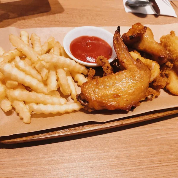 fried chicken wings with sauce and ketchup Stock Image Everypixel