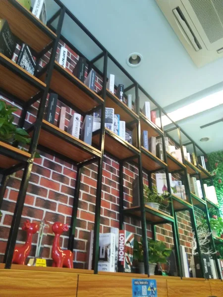 library interior with books and bookshelf