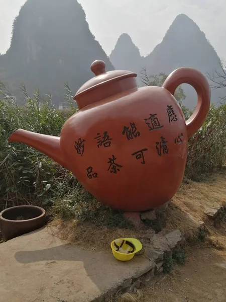 a cup of tea on a background of a mountain ash