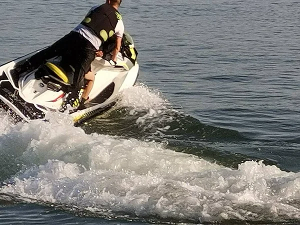 man in a boat with a jet