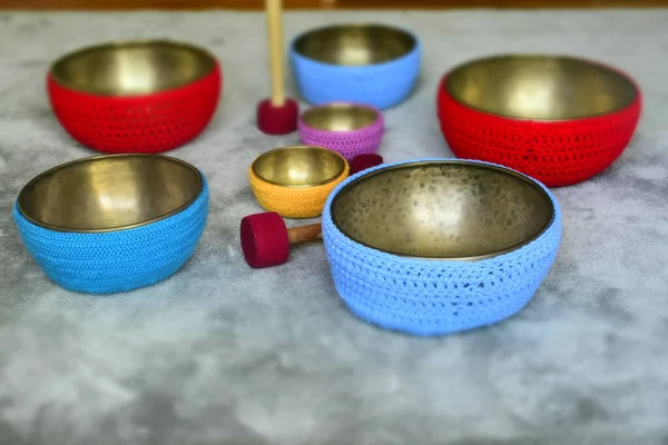a closeup shot of a bowl of a ceramic bowls with a blue lid