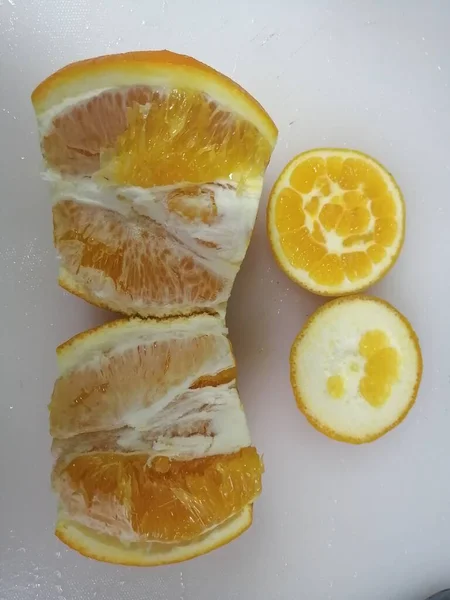 fresh sliced lemon on a white background