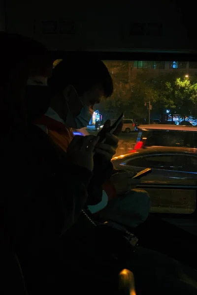 man in a car with a mask