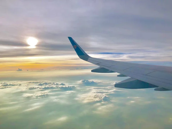 wing of a plane in the sky