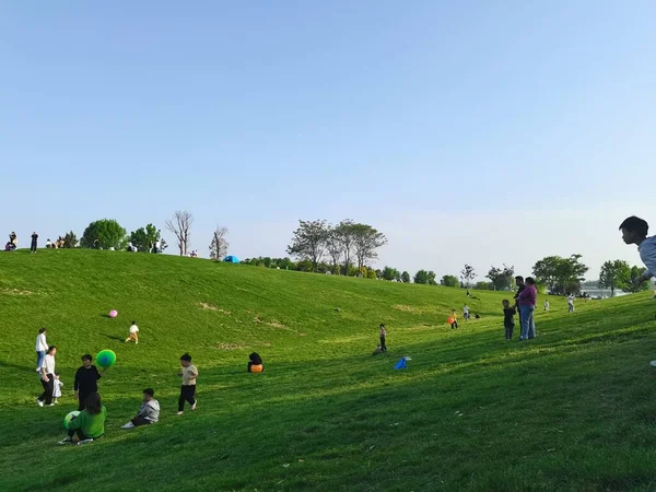 a group of people in the park