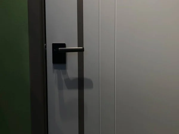 open door with a lock