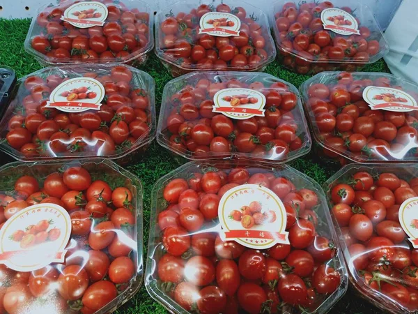 fresh red tomatoes in a market