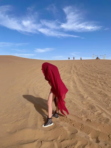a beautiful shot of a woman in a desert