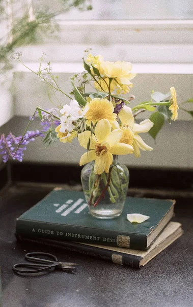 old book with flowers and leaves